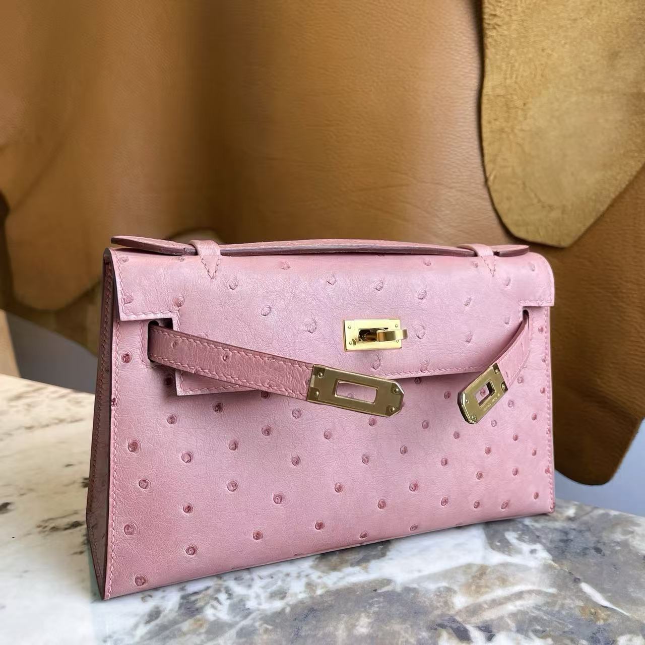 1:1復刻高仿Hermes bag 手袋 Kelly一代鴕鳥皮陶瓷粉金扣 99%真